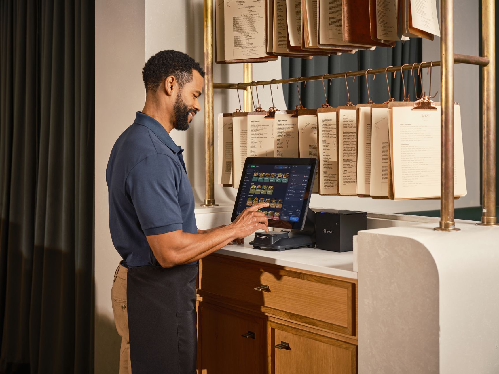 Screen showing intuitive restaurant software dashboard for order management, inventory tracking, and staff scheduling.